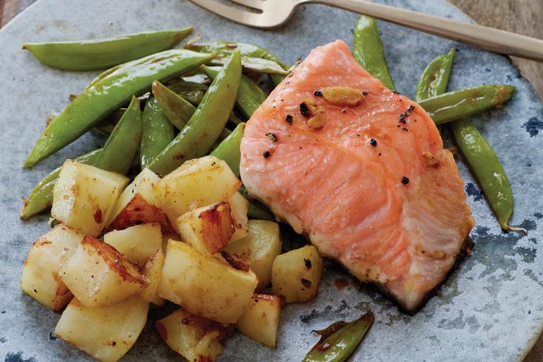 Salmon plated with snap peas and potatoes